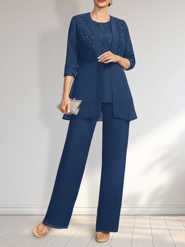 Vestido de novia de gasa con encaje y lentejuelas, estilo mono/traje pantalón, largo hasta el suelo, con escote redondo.