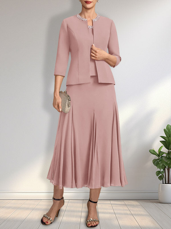 Vestido de novia de gasa, corte línea A, escote redondo, largo té, con lentejuelas y pedrería. 