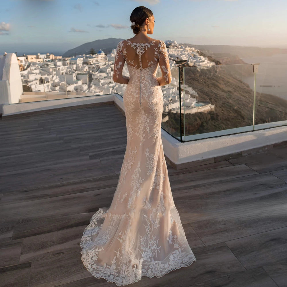 Preciosos vestidos de novia de sirena de encaje de manga larga con apliques de lujo, botones, cola desmontable y cuerno.