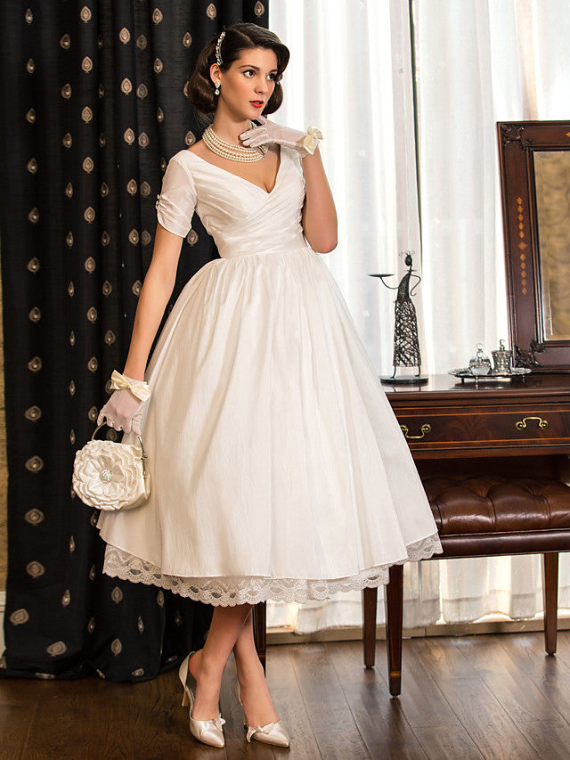 Vestidos de novia cortos estilo vintage de los años 50, corte en A, escote en V y mangas