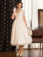 Vestidos de novia cortos estilo vintage de los años 50, corte en A, escote en V y mangas