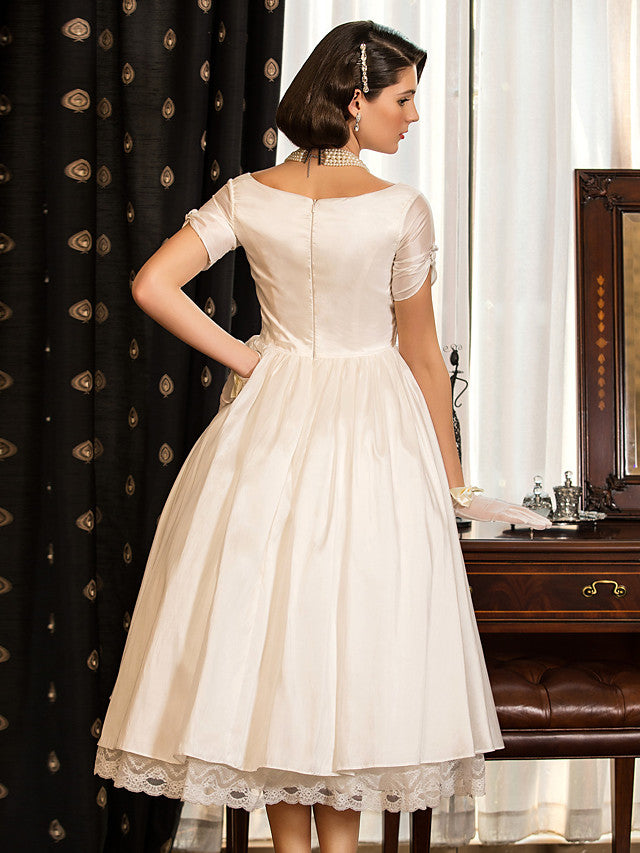 Vestidos de novia cortos estilo vintage de los años 50, corte en A, escote en V y mangas