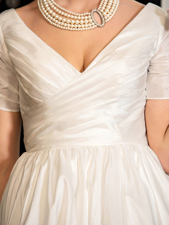 Vestidos de novia cortos estilo vintage de los años 50, corte en A, escote en V y mangas
