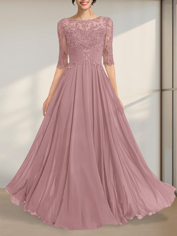 Vestido de novia de corte A, escote ilusión, largo hasta el suelo, de gasa y encaje, con lentejuelas plisadas.