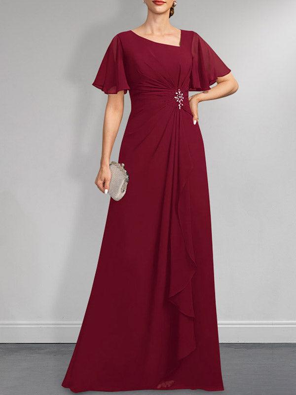 Vestido de corte A asimétrico hasta el suelo para la madre de la novia, de gasa, con lentejuelas y plisados.