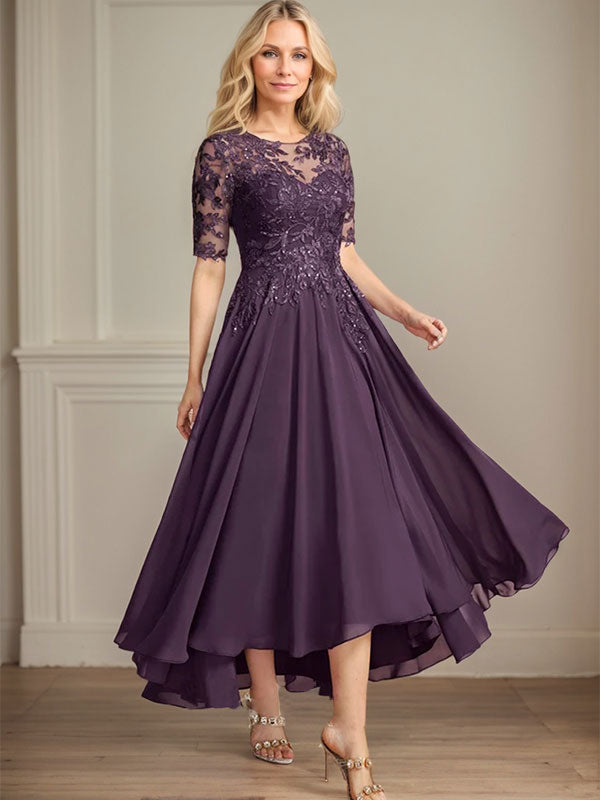Robe de mère de la mariée asymétrique en mousseline de soie et dentelle, coupe trapèze, décolleté illusion, ornée de sequins 