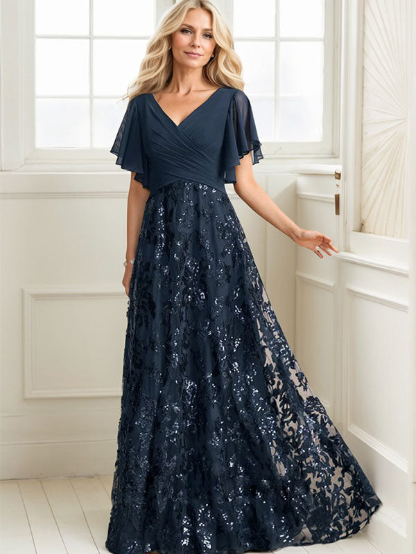 Vestido de novia de corte A, escote en V, largo hasta el suelo, de encaje, lentejuelas y gasa, con pliegues.