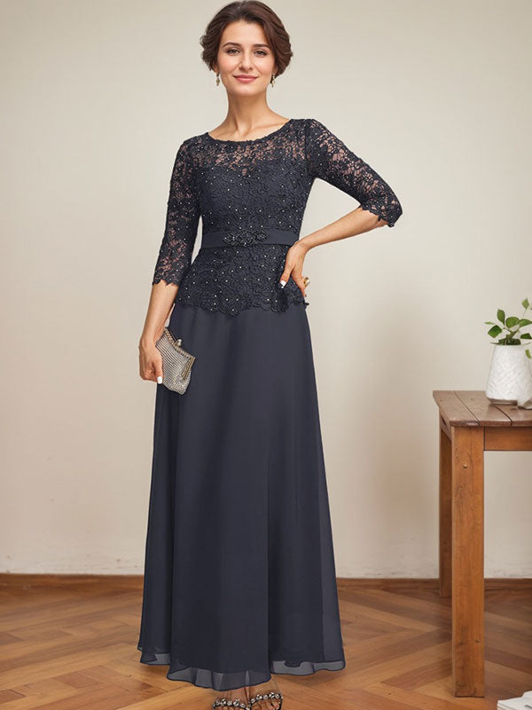Vestido de novia corte A, escote redondo ilusión, largo hasta el tobillo, de gasa y encaje, con pedrería y detalles de diamantes de imitación. 