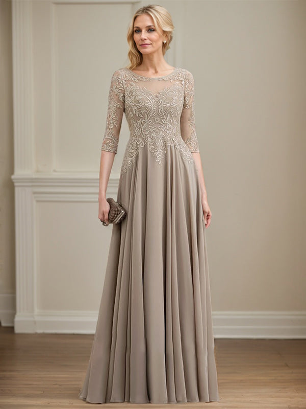 Vestido de novia de corte A, escote redondo, ilusión, largo hasta el suelo, de encaje y gasa con lentejuelas. 