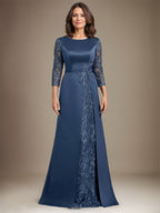 Robe de mère de la mariée en satin de dentelle, coupe trapèze, longue jusqu'au sol, ornée d'appliqués, avec décolleté plongeant et bretelles.