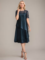 Vestido de corte A, escote redondo, largo hasta la rodilla, para la madre de la novia, con apliques y lentejuelas. 