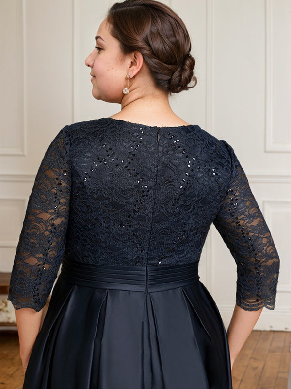Vestido de novia de satén con encaje, corte en A, escote en V y largo hasta el suelo, con lazo de lentejuelas. 