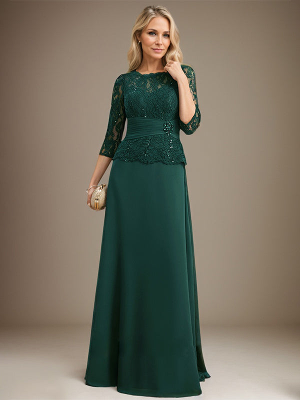 Vestido de corte A, escote ilusión, largo hasta el suelo, de gasa y encaje, para la madre de la novia, con lentejuelas plisadas y pedrería. 