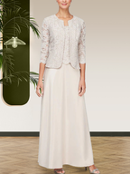 Robe jupe-veste en dentelle pailletée et satin avec veste ouverte