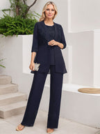 Vestido de novia de gasa con encaje y lentejuelas, estilo mono/traje pantalón, largo hasta el suelo, con escote redondo.