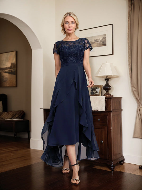 Robe de mère de la mariée asymétrique en mousseline de soie et dentelle, coupe trapèze, décolleté en V, effet illusion, nœud, volants et sequins 