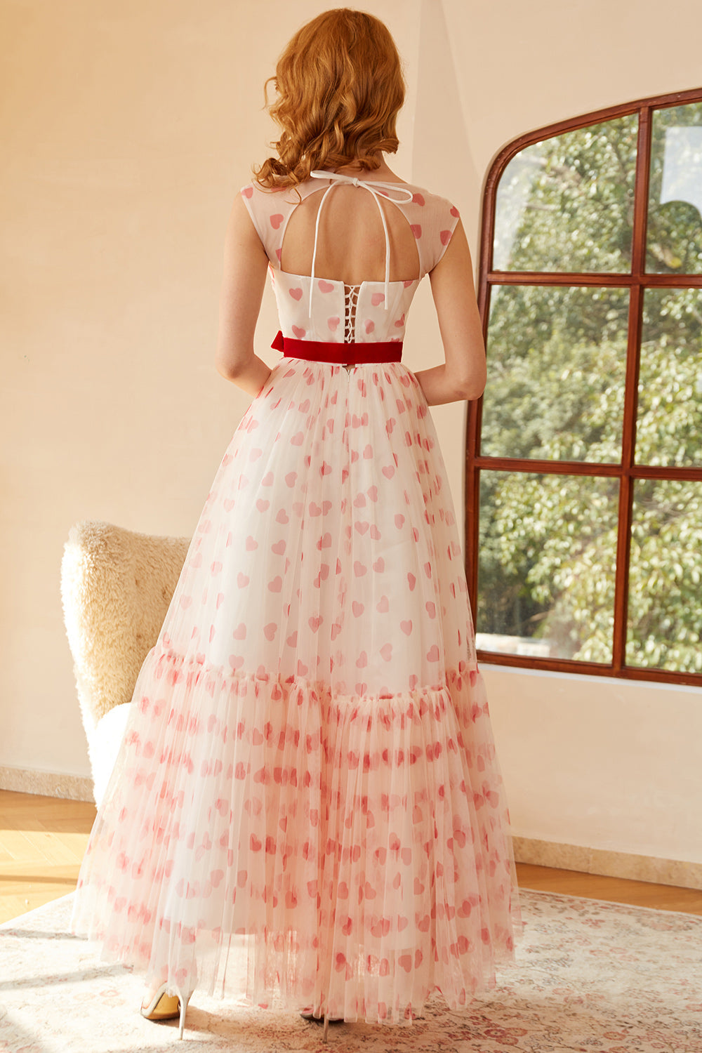 Robe de bal longue princesse trapèze décolleté cœur avec nœud papillon