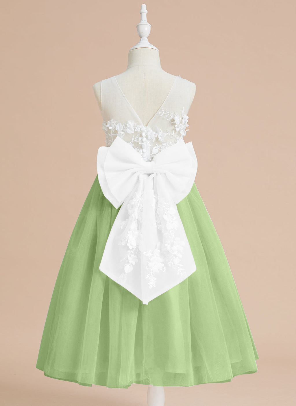 Vestido midi de encaje floral y lazo grande 