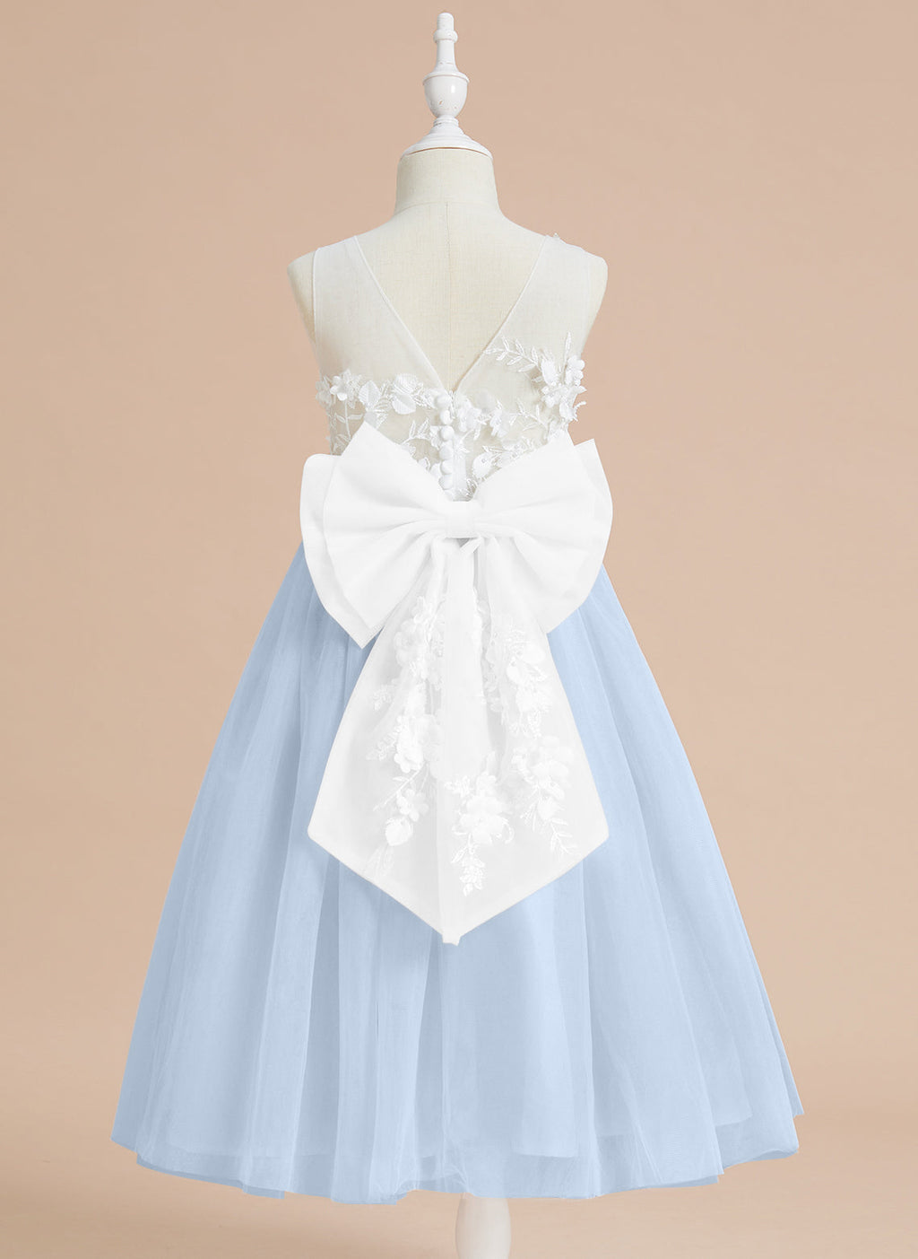 Vestido midi de encaje floral y lazo grande 