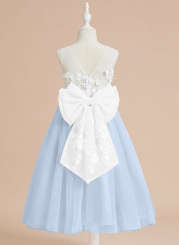 Vestido midi de encaje floral y lazo grande 