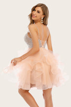 Robe courte de bal perlée