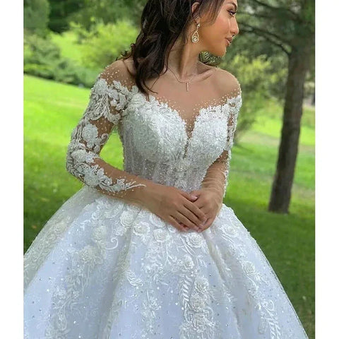 Vestido de novia musulmán de lujo 2025, elegante, de manga larga, con apliques de encaje, corte en A, ideal para bodas en la playa, fiestas de princesas, cuello redondo, modelo WD001