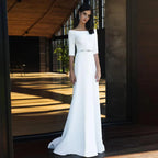 Vestido de novia largo con escote, media manga, abalorios, fajas y cola larga 