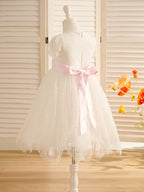 Vestido de niña de las flores de la Primera Comunión color marfil con encaje 