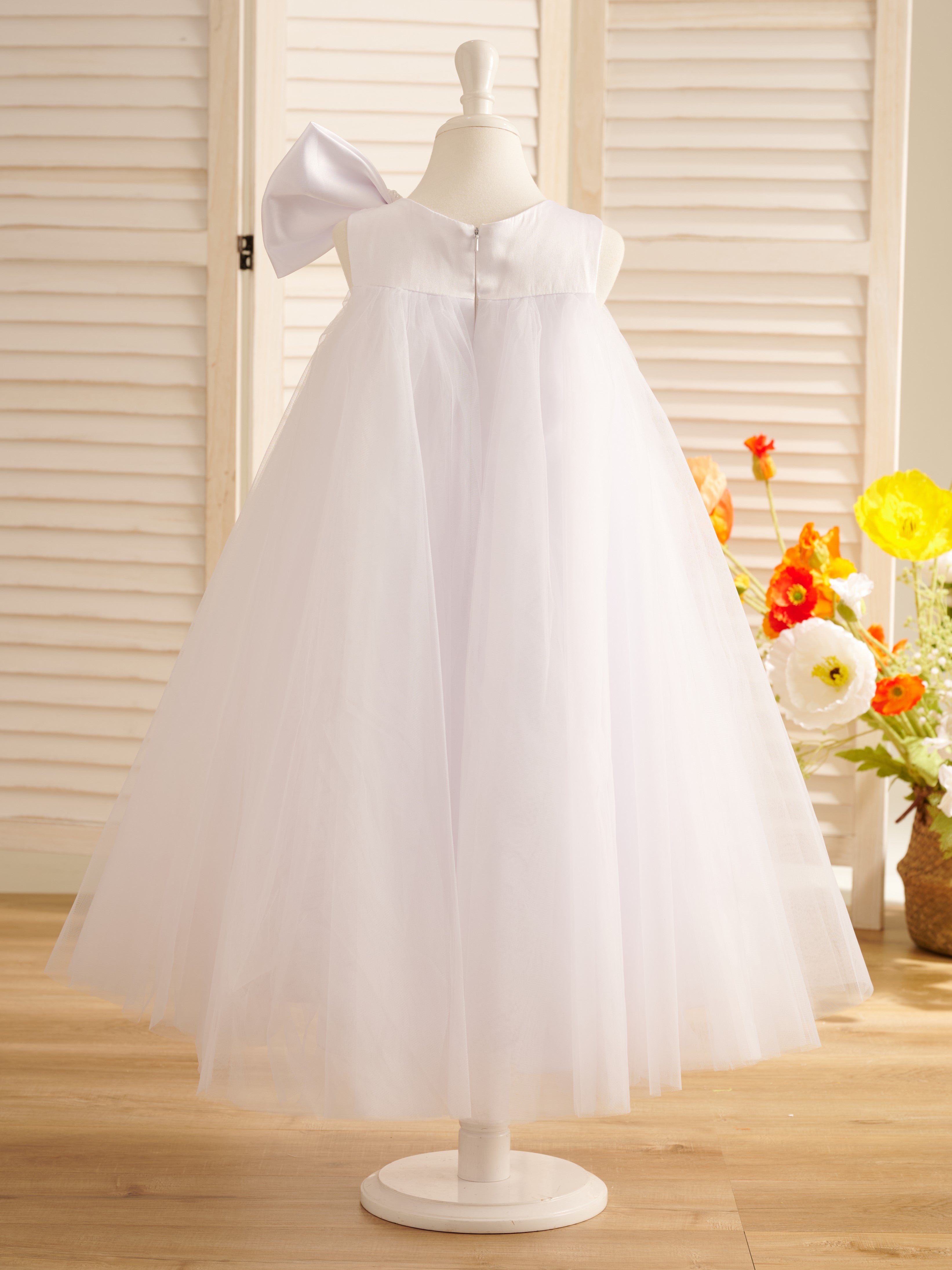Vestido de niña pequeña de las flores, corte en A, con gran lazo y tul, hasta la rodilla. 