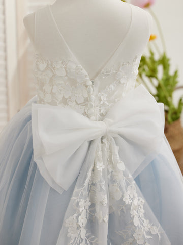 Vestido midi de encaje floral y lazo grande 