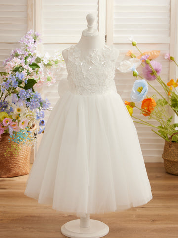 Vestido midi de encaje floral y lazo grande 