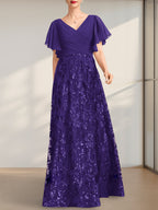 Vestido de novia de corte A, escote en V, largo hasta el suelo, de encaje, lentejuelas y gasa, con pliegues.