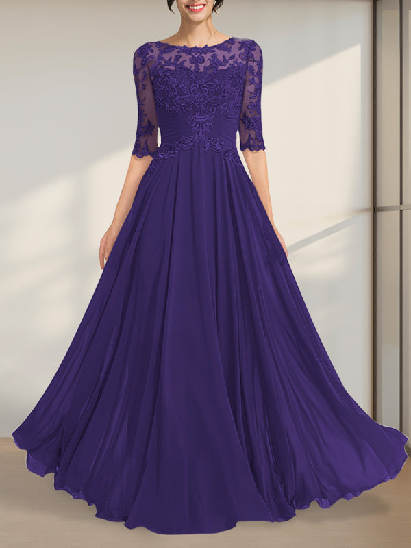 Vestido de novia de corte A, escote ilusión, largo hasta el suelo, de gasa y encaje, con lentejuelas plisadas.