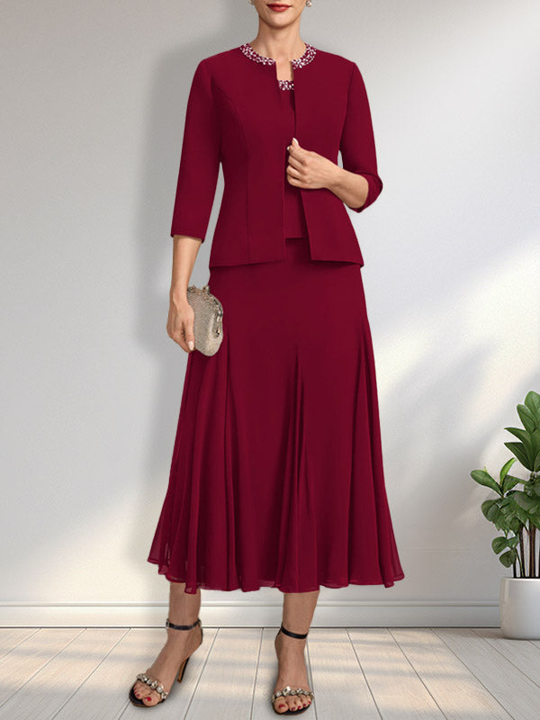 Vestido de novia de gasa, corte línea A, escote redondo, largo té, con lentejuelas y pedrería. 