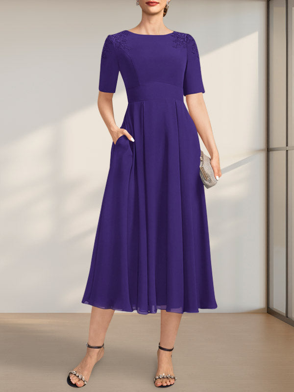 Vestido de corte A, escote redondo, largo té, de gasa, para la madre de la novia, con apliques de encaje y lentejuelas.