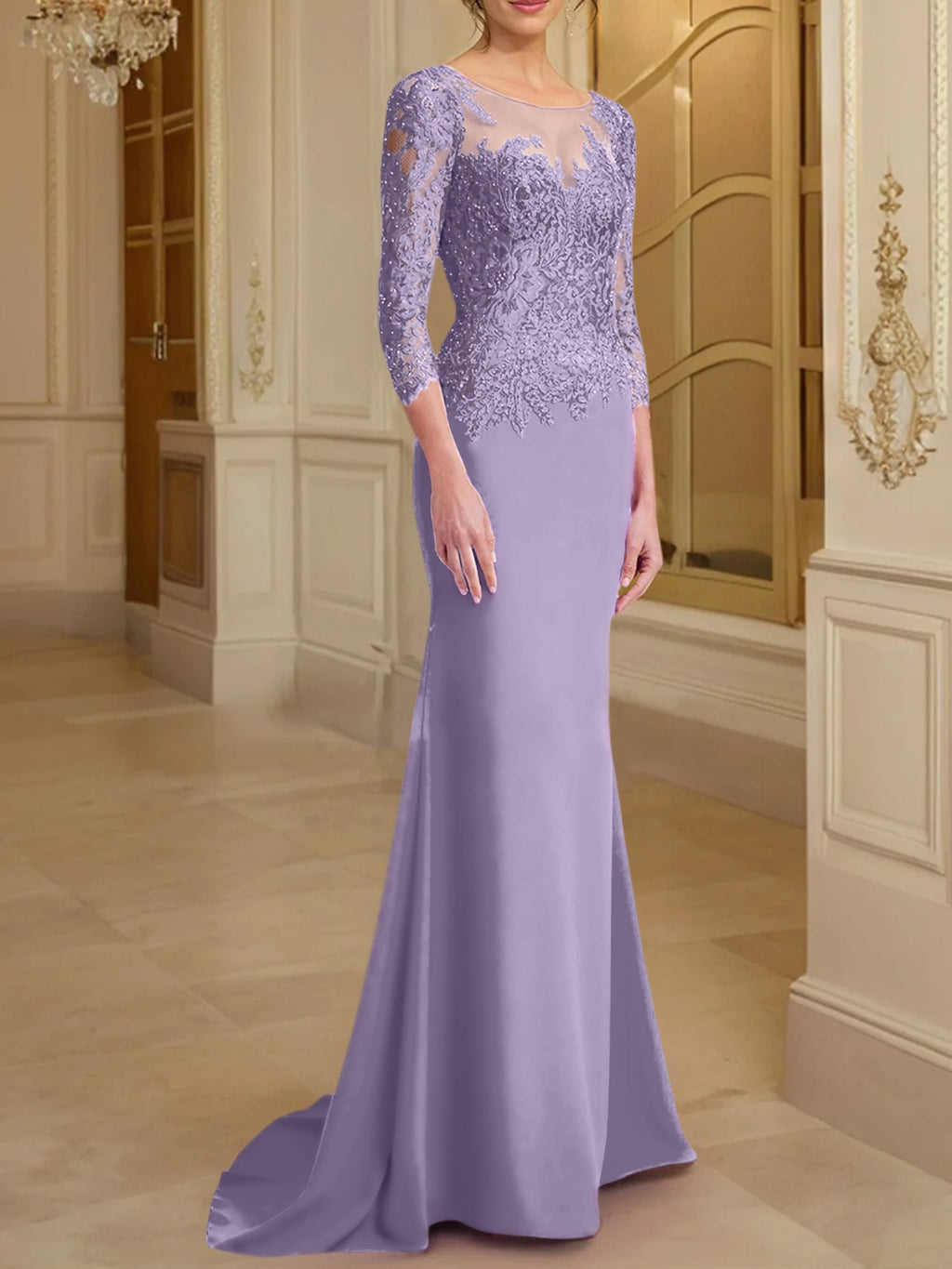 Robe de mère de la mariée en dentelle, coupe trompette/sirène, manches longues et décolleté rond. 
