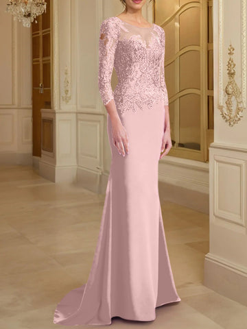 Robe de mère de la mariée en dentelle, coupe trompette/sirène, manches longues et décolleté rond. 