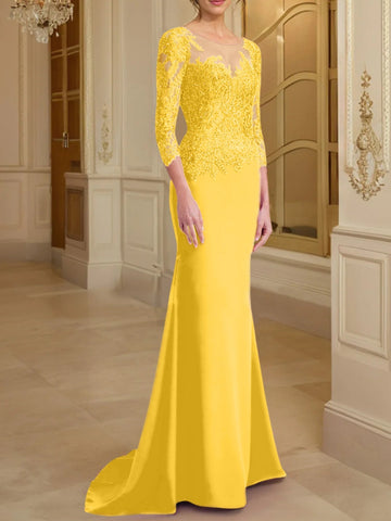 Robe de mère de la mariée en dentelle, coupe trompette/sirène, manches longues et décolleté rond. 