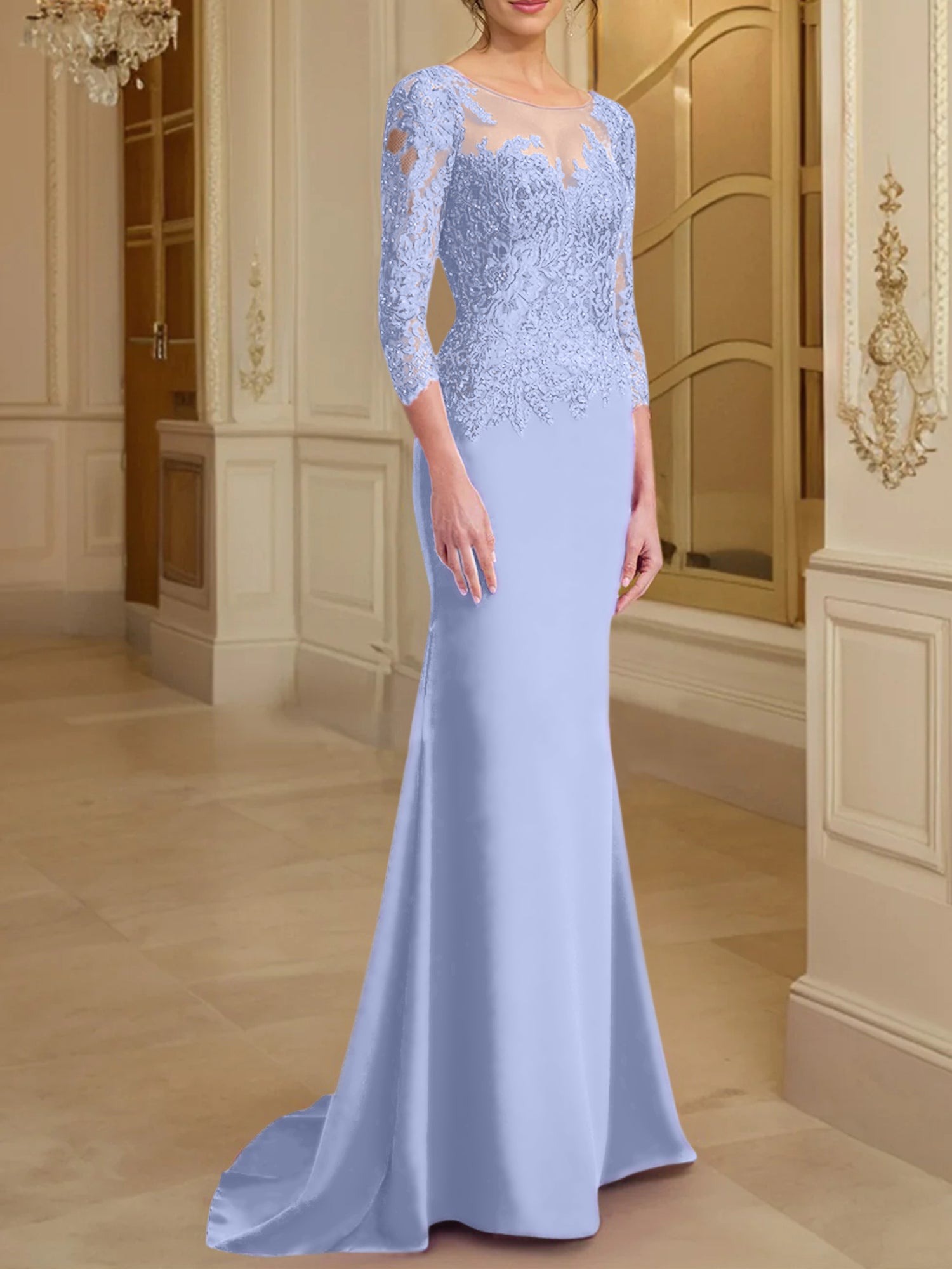 Robe de mère de la mariée en dentelle, coupe trompette/sirène, manches longues et décolleté rond. 