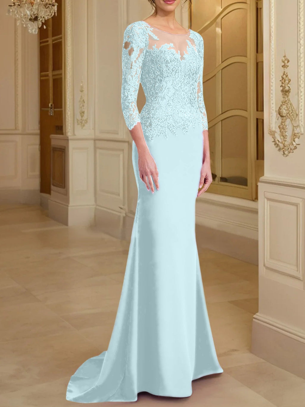 Robe de mère de la mariée en dentelle, coupe trompette/sirène, manches longues et décolleté rond. 