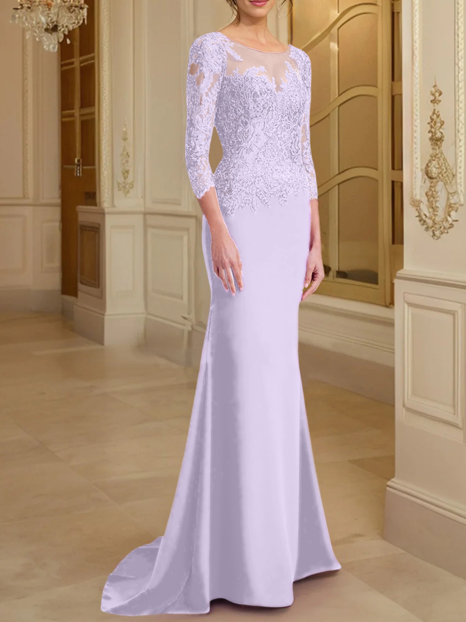 Robe de mère de la mariée en dentelle, coupe trompette/sirène, manches longues et décolleté rond. 