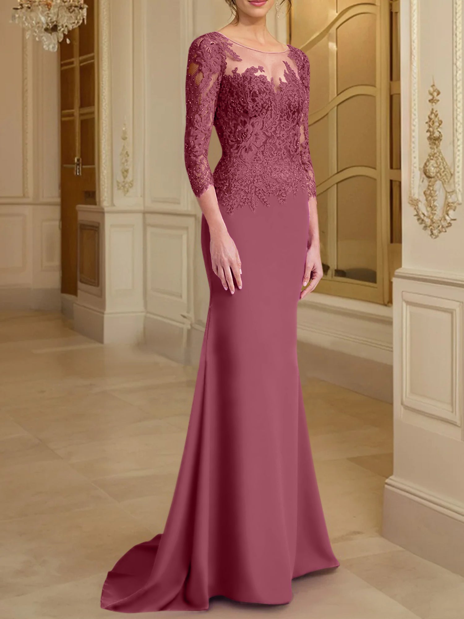 Robe de mère de la mariée en dentelle, coupe trompette/sirène, manches longues et décolleté rond. 