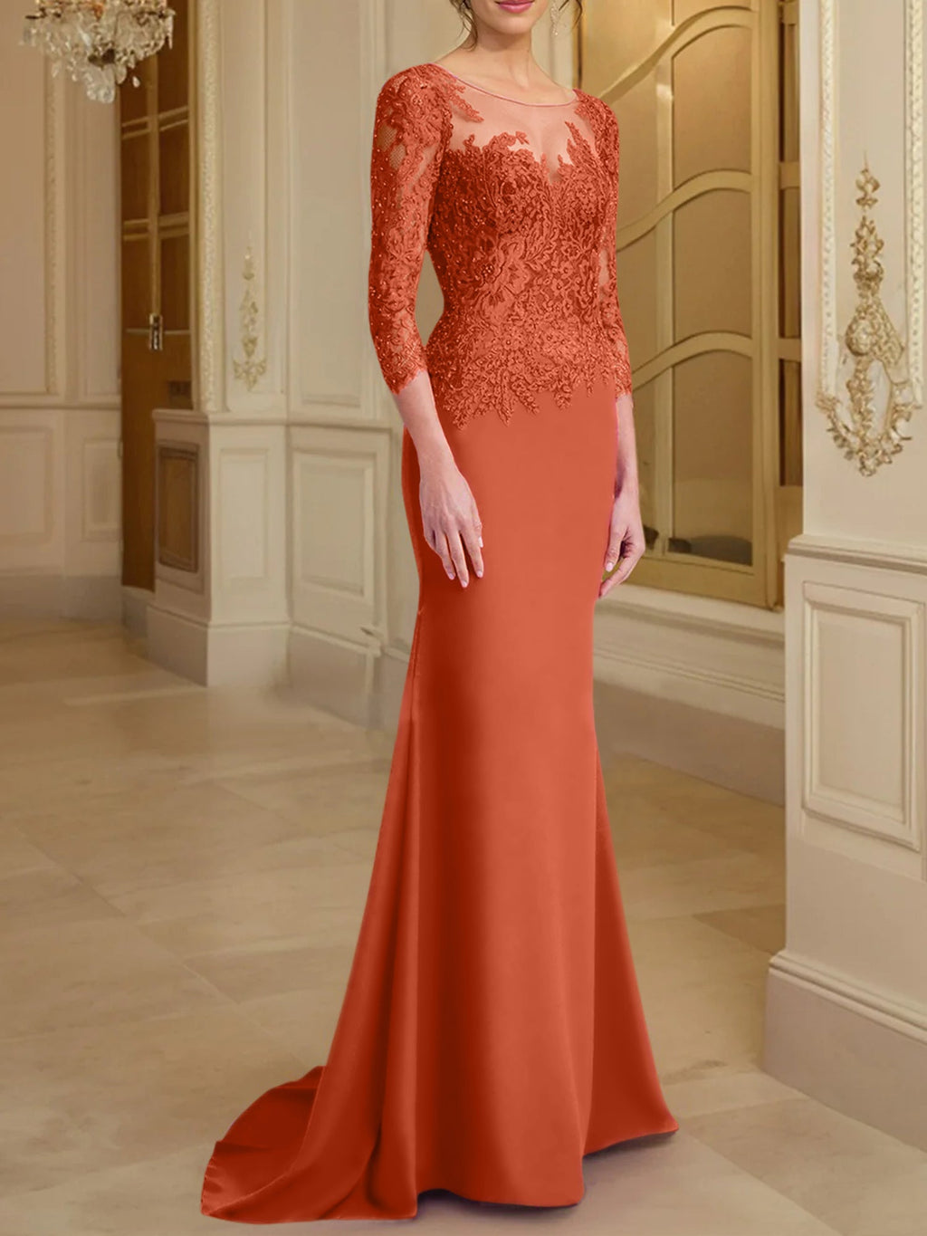 Robe de mère de la mariée en dentelle, coupe trompette/sirène, manches longues et décolleté rond. 
