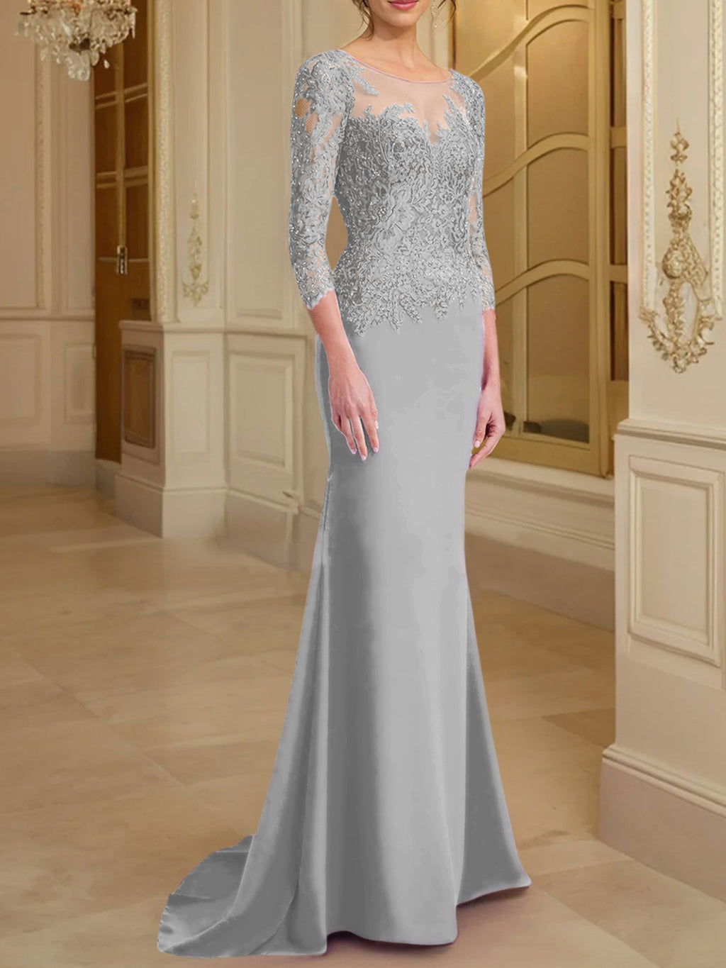 Robe de mère de la mariée en dentelle, coupe trompette/sirène, manches longues et décolleté rond. 