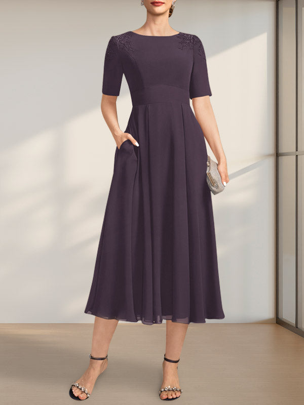 Vestido de corte A, escote redondo, largo té, de gasa, para la madre de la novia, con apliques de encaje y lentejuelas.