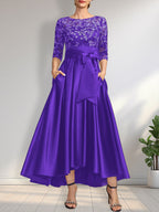 Vestido de madrina de la novia, corte asimétrico, escote ilusión, satén y encaje, con lazo.