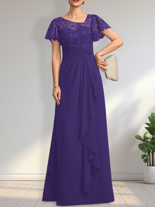 Vestido de novia de corte asimétrico, ilusión, largo hasta el suelo, de encaje y gasa, con cascada de volantes y lentejuelas. 