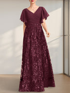 Vestido de novia de corte A, escote en V, largo hasta el suelo, de encaje, lentejuelas y gasa, con pliegues.