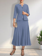 Vestido de novia de gasa, corte línea A, escote redondo, largo té, con lentejuelas y pedrería. 