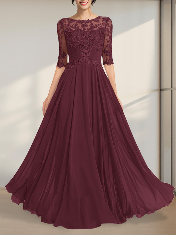 Robe de mère de la mariée en mousseline de soie et dentelle, coupe trapèze, longueur au sol, décolleté illusion, ornée de sequins plissés